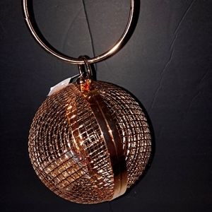 Gold ball clutch bag